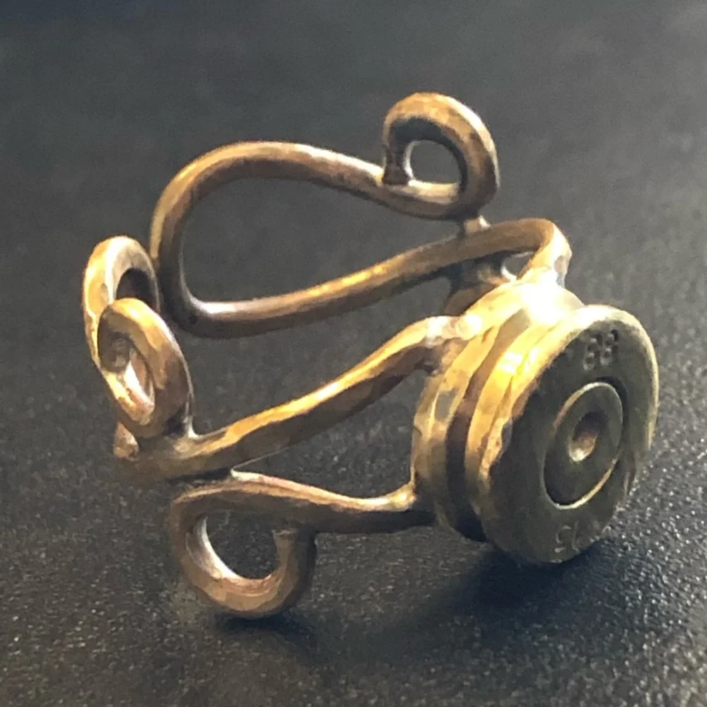 Vintage handmade hammered brass bullet primer ring